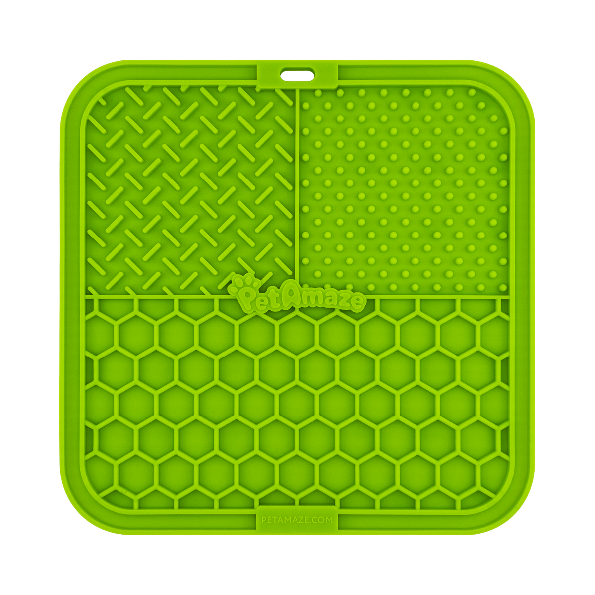 Green silicone mat with textured surface on a white background 