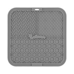 Gray silicone mat with textured surface on a white background 