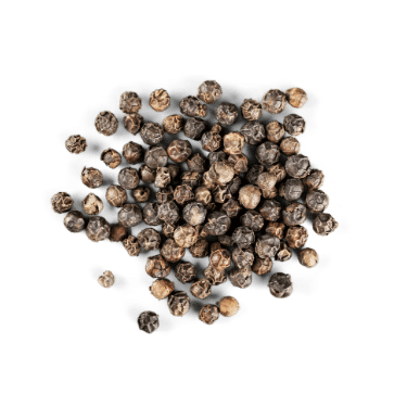 A small pile of whole black peppercorns with textured, wrinkled skins, photographed from above on a plain white background.